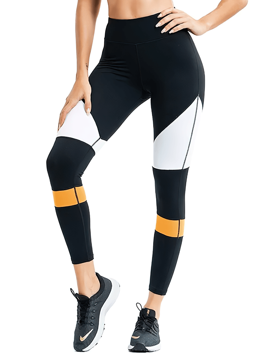 Women's stylish high-waisted leggings with vibrant white and orange accents, perfect for yoga, running, or gym workouts.